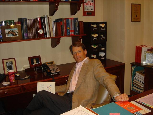 Dr. Thorne at desk